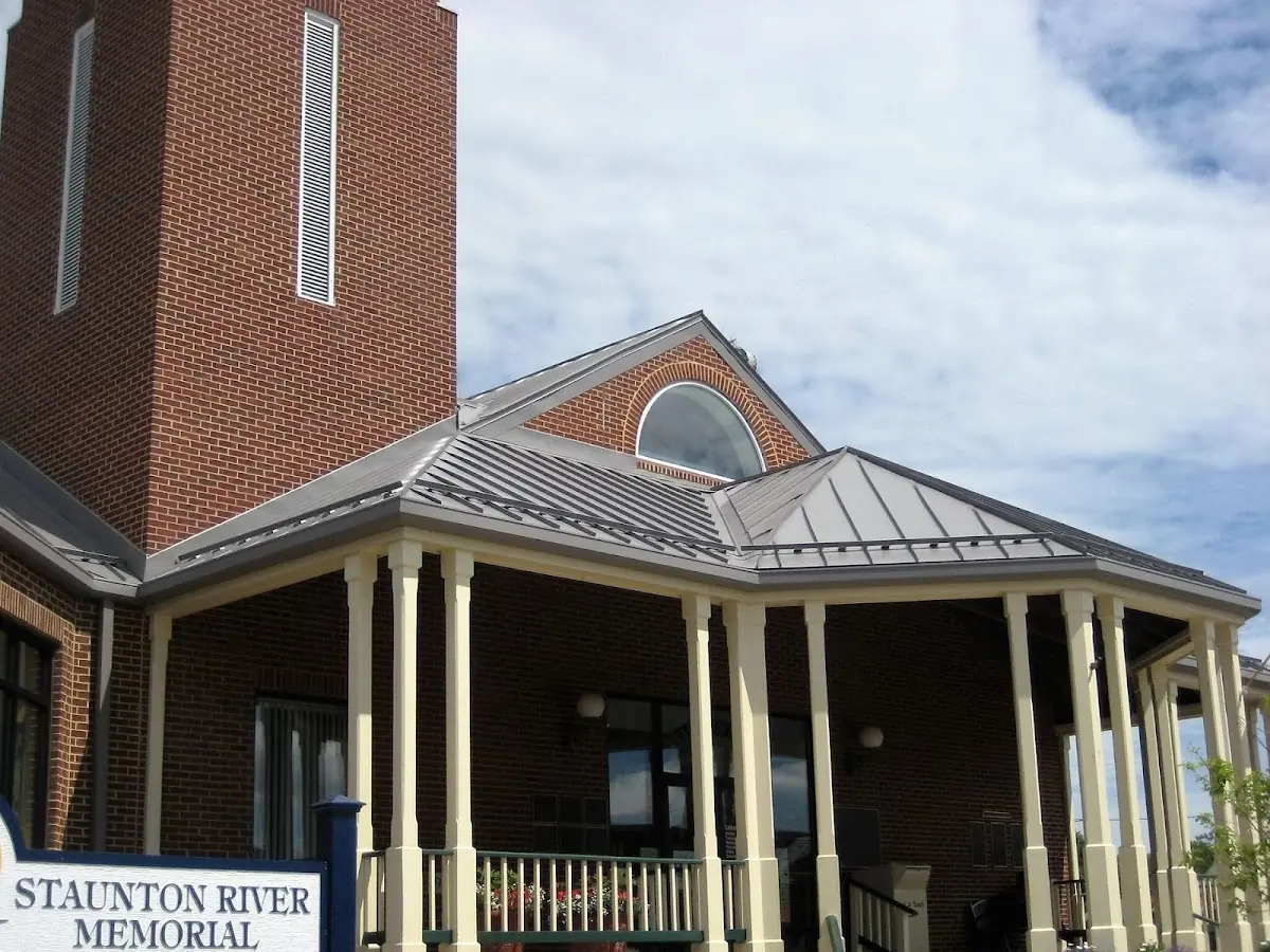 Skilled roofing craftsmen working on a residential roof in Benton City